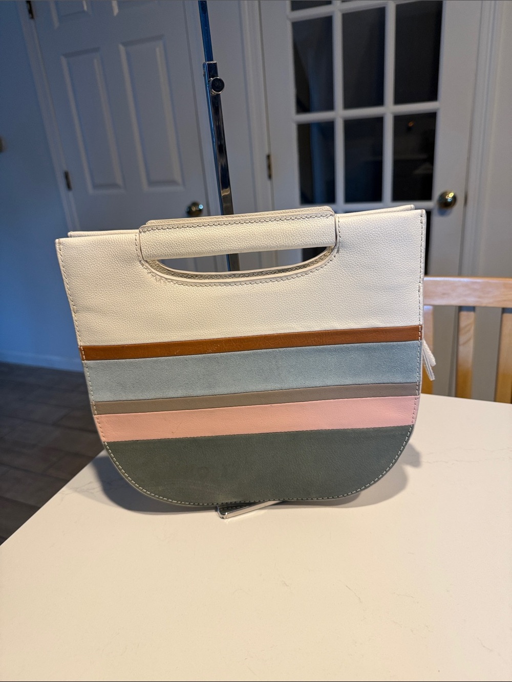 Fossil White Multi-Stripe Crossbody Bag with Pink and Blue Accents
